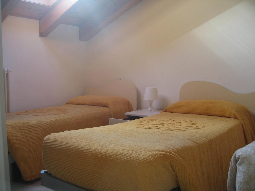 Green Village Accommodations Colico Room photo